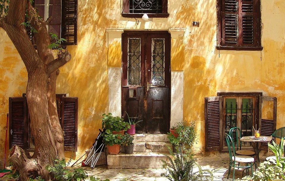 yellow painted house wooden doors